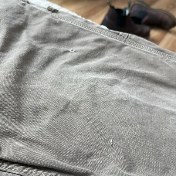 Carhartt distressed carpenter pants with some stains and holes. #10015 - Picture 8 of 11